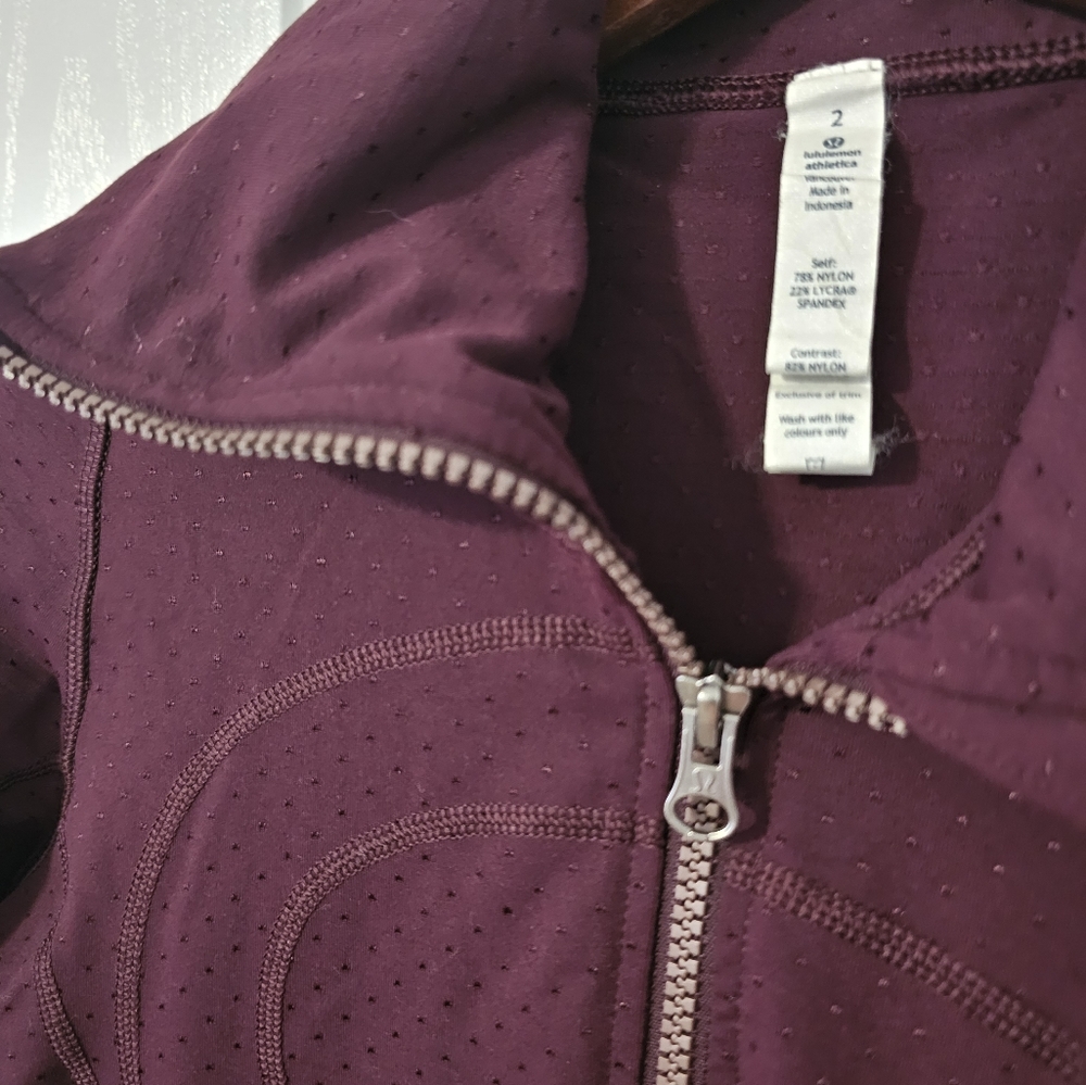 Lululemon zip up hooded jacket. Size 2.